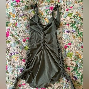 Goa Magic suede swim with cutouts. Xs.